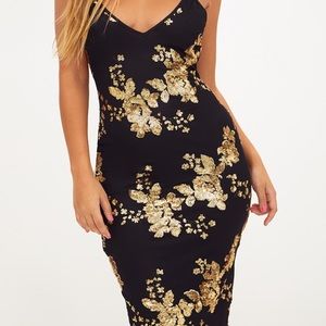 Black and gold sequin midi dress.